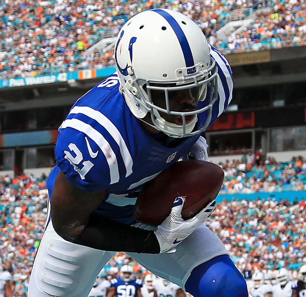 MIAMI GARDENS FL- DECEMBER 27 Vontae Davis #21 of the Indianapolis Colts intercepts the ball in the endzone during the first quarter of the game against the Miami Dolphins at Sun Life Stadium