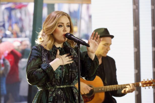 Heidi Gutman  NBC via AP
Adele performs on the