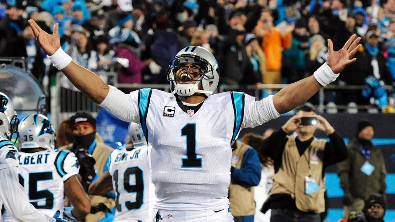 Carolina Panthers Cam Newton celebrates his touchdown run during the second half the NFL football NFC Championship game against the Arizona Cardinals Sunday
