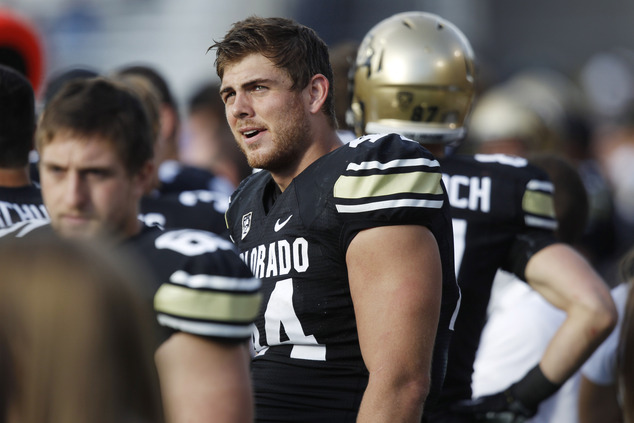 Colorado tight end Nick Kasa watches from the sideline as Colorado trails Washington during an NCAA college footbal