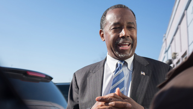 Republican presidential candidate Ben Carson speaks to reporters after stopping at The Airport Diner